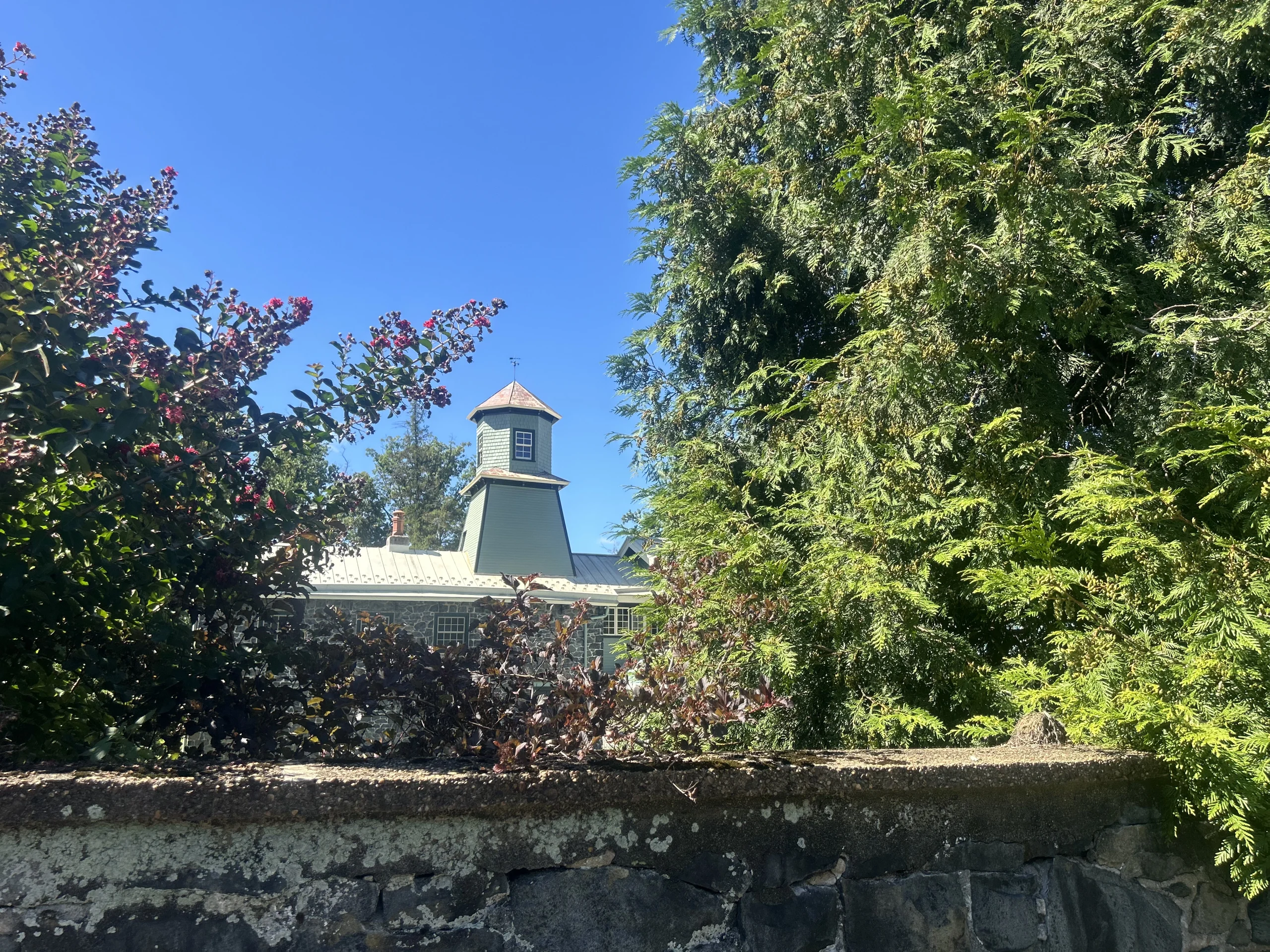 Historic Carriage House at Rockwood Park seen from the garden